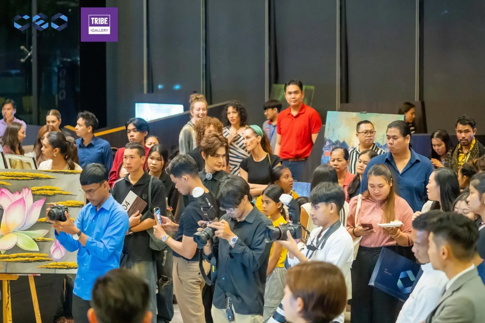 Media, guests and visitors attending the 2025 PONLEU charity fundraising art exhibition