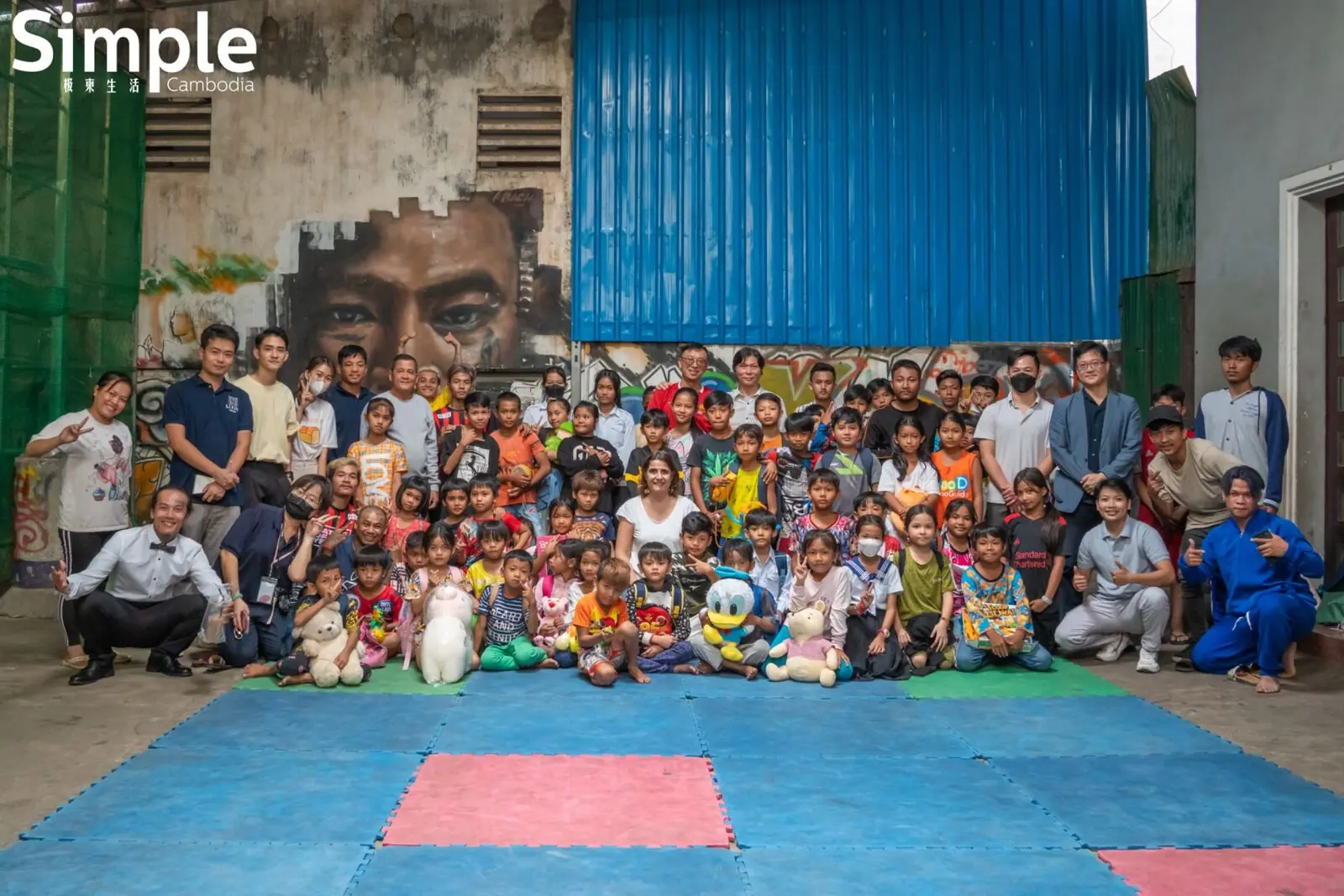 LIXIN Group representatives, partners and children at a Tiny Toones annual donation event